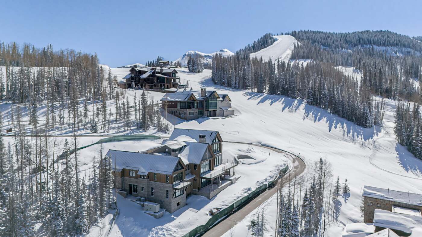 Ski-in/ski-out Ridge Collection homesites flanked by Telluride ski runs — aerial view