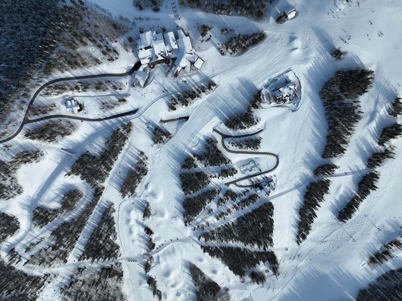 Top-down aerial of The Ridge Collection private enclave and heated road, Mountain Village, Colorado